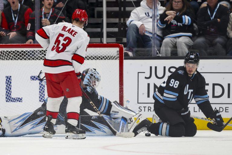 Utah’s Karel Vejmelka (49 saves) stymies Hurricanes