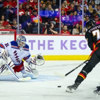 Flames squander lead, recover to beat Rangers