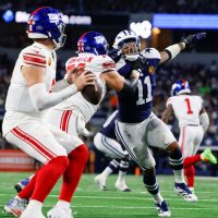 Cowboys finally win at home, hand Giants seventh straight loss