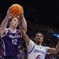 No. 1 Kansas overwhelms Furman in 2nd half, wins 86-51