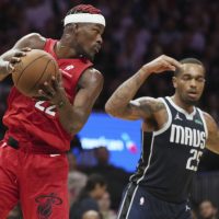 Jimmy Butler scores 33, Heat hold off Mavericks in OT