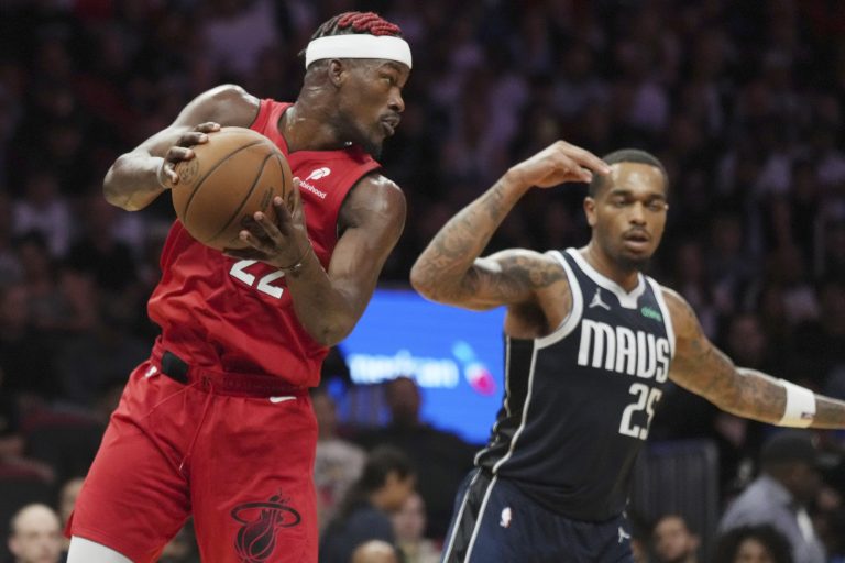 Jimmy Butler scores 33, Heat hold off Mavericks in OT