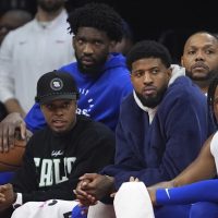 Injured Embiid, Paul George watch from 76ers’ bench again